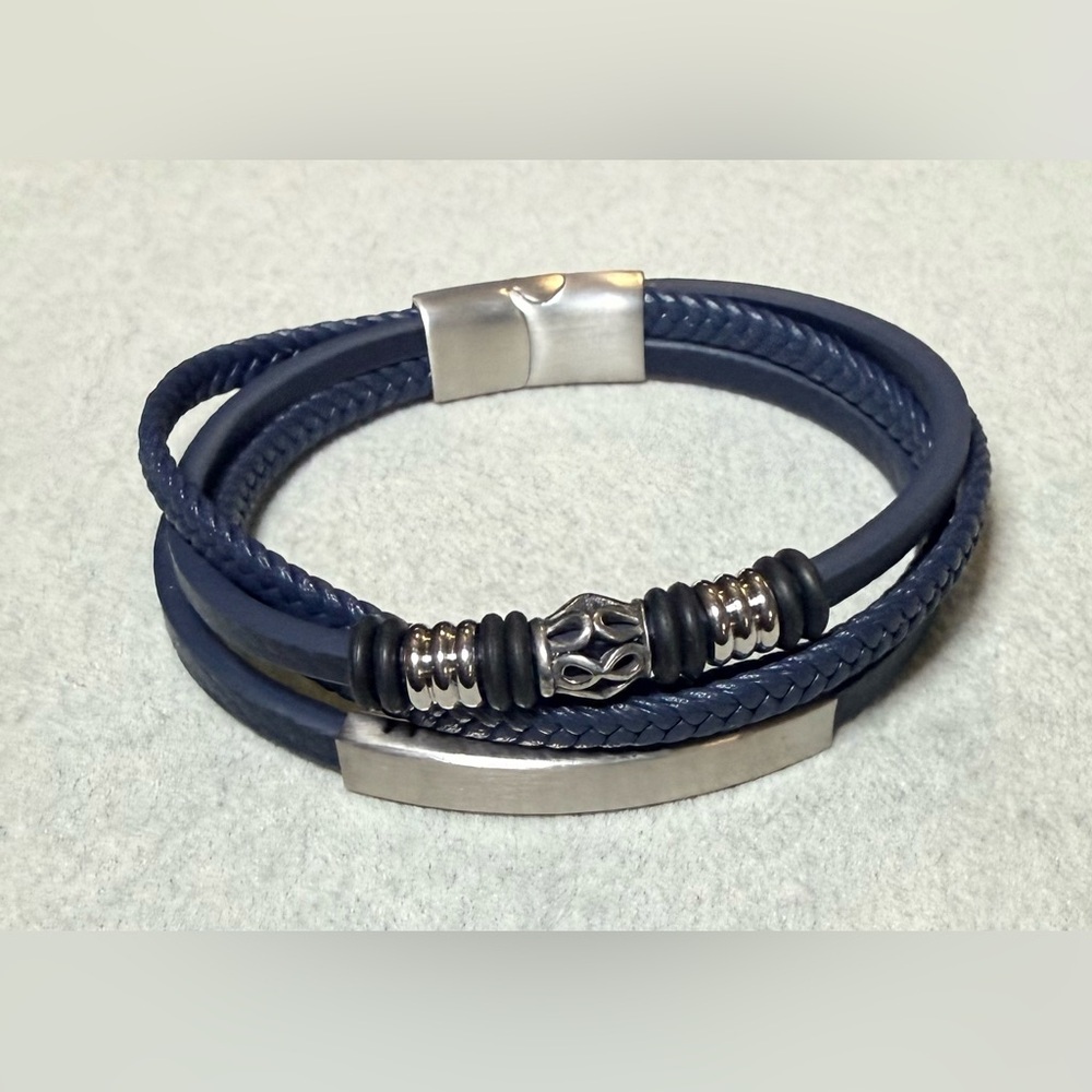 Men’s stainless steel and multilayer faux leather bracelet
8”
New
